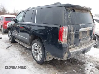 2020 GMC Yukon Denali with VIN 1GKS2CKJ5LR301216, listed as a IAAI auction lot 41439076 with 76,129 mi miles. Bid and sale history available at carsss.com. Image 3.