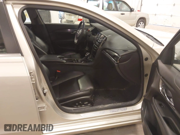 2013 Cadillac ATS with VIN 1G6AG5RX8D0138326, listed as a IAAI auction lot 41971289 with 121,805 mi miles and . Bid and sale history available at DreamBid. Image 5.