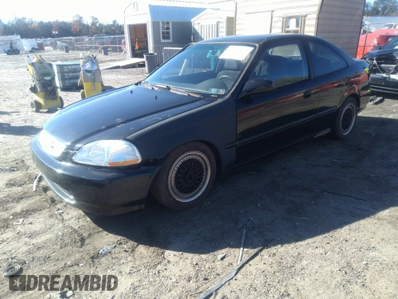 1998 Honda Civic DX with VIN 1HGEJ6122WL069075, listed as a IAAI auction lot 40932423 with 125,277 mi miles. Bid and sale history available at carsss.com. Image 2.