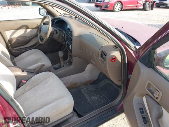 1996 Toyota Camry DX z VIN 4T1BG12K3TU662835, wystawiony jako IAAI lot #42060645 z przebiegiem 195 600 mil mil oraz . Historia ofert i sprzedaży dostępna na DreamBid. Obrazek 5.