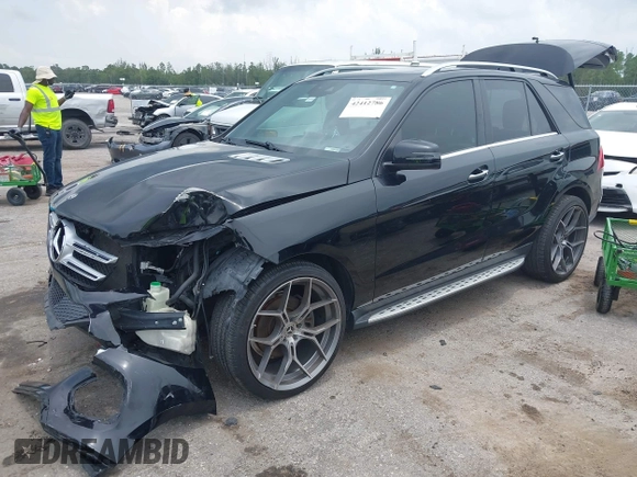 2017 Mercedes-Benz GLE 350 with VIN 4JGDA5JB5HA962825, listed as a IAAI auction lot 42412786 with 98,905 mi miles and . Bid and sale history available at DreamBid. Image 2.