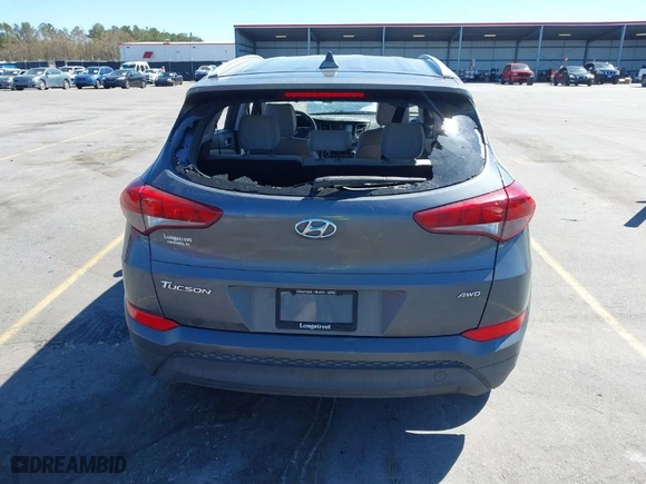 2018 Hyundai Tucson SEL with VIN KM8J3CA48JU718402, listed as a IAAI auction lot 41810363 with 218,853 mi miles. Bid and sale history available at carsss.com. Image 16.