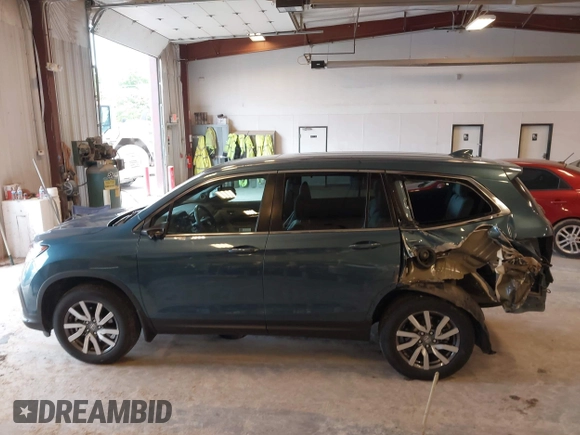 2021 Honda Pilot EX-L z VIN 5FNYF6H54MB082455, wystawiony jako IAAI lot #42343787 z przebiegiem 25 954 mil mil oraz . Historia ofert i sprzedaży dostępna na DreamBid. Obrazek 14.