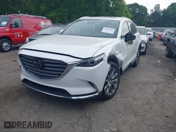 2019 Mazda CX-9 Signature with VIN JM3TCBEY8K0327724, listed as a IAAI auction lot 42068769 with 77,823 mi miles and . Bid and sale history available at DreamBid. Image 2.