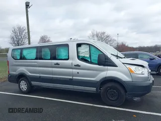 2018 Ford Transit Passenger XL z VIN 1FBZX2ZM2JKB02141, wystawiony jako IAAI lot #41914073 z przebiegiem 103 718 mil mil oraz . Historia ofert i sprzedaży dostępna na DreamBid. Obrazek 13.