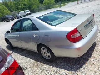 2002 Toyota Camry XLE z VIN 4T1BF32K42U531992, wystawiony jako IAAI lot #42294926 z przebiegiem 294 929 mil mil oraz . Historia ofert i sprzedaży dostępna na DreamBid. Obrazek 3.