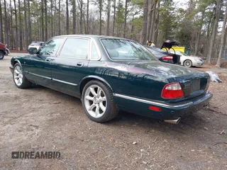 2003 Jaguar XJ with VIN SAJDA15B53MF53212, listed as a IAAI auction lot 41613266 with 180,165 mi miles and . Bid and sale history available at DreamBid. Image 3.
