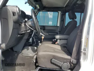 2018 Jeep Wrangler JK Unlimited Sport with VIN 1C4BJWDG9JL876212, listed as a Copart auction lot 45479375 with 79,136 mi miles and Salvage Title. Bid and sale history available at carsss.com. Image 7.