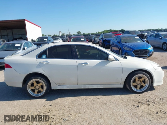 2007 Acura TSX z VIN JH4CL96817C011893, wystawiony jako IAAI lot #42231111 z przebiegiem 162 577 mil mil oraz . Historia ofert i sprzedaży dostępna na DreamBid. Obrazek 14.