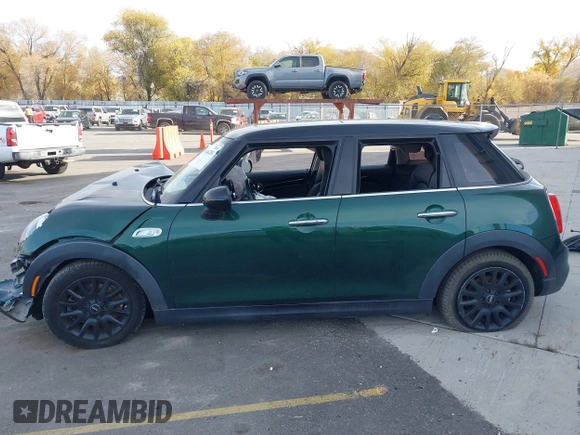 2016 MINI Cooper Hardtop 4 Door S with VIN WMWXU3C58G2D28227, listed as a IAAI auction lot 38046281 with 56,694 mi miles. Bid and sale history available at carsss.com. Image 15.