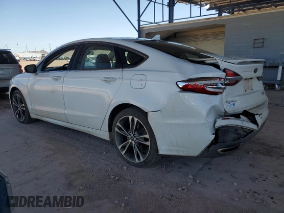 2020 Ford Fusion Titanium with VIN 3FA6P0D94LR191852, listed as a Copart auction lot 56948825 with 116,138 mi miles and Salvage title. Bid and sale history available at DreamBid. Image 2.