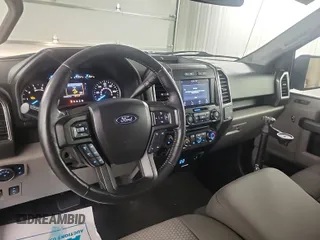 2018 Ford F-150 XL with VIN 1FTEW1EP1JKE55493, listed as a IAAI auction lot 42666714 with 104,452 mi miles and . Bid and sale history available at DreamBid. Image 27.