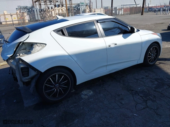 2015 Hyundai Veloster with VIN KMHTC6AD3FU227852, listed as a IAAI auction lot 41657406 with 179,185 mi miles. Bid and sale history available at carsss.com. Image 4.