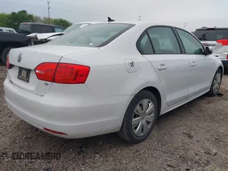 2014 Volkswagen Jetta SE with VIN 3VWD07AJ8EM296808, listed as a IAAI auction lot 41894682 with 193,898 mi miles and . Bid and sale history available at DreamBid. Image 4.