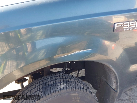 2004 Ford F-350 XL with VIN 1FTSF31L84EB90477, listed as a IAAI auction lot 41894632 with 212,107 mi miles and . Bid and sale history available at DreamBid. Image 14.
