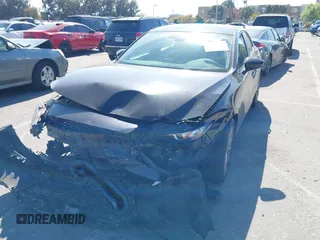 2021 Mazda 3 Select with VIN 3MZBPABL2MM250695, listed as a IAAI auction lot 42001485 with 29,672 mi miles and . Bid and sale history available at DreamBid. Image 2.