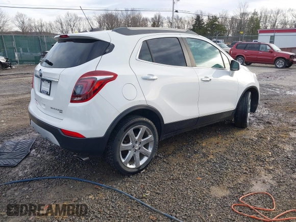 2017 Buick Encore Essence with VIN KL4CJGSB3HB014907, listed as a IAAI auction lot 41643044 with 64,769 mi miles and . Bid and sale history available at carsss.com. Image 4.