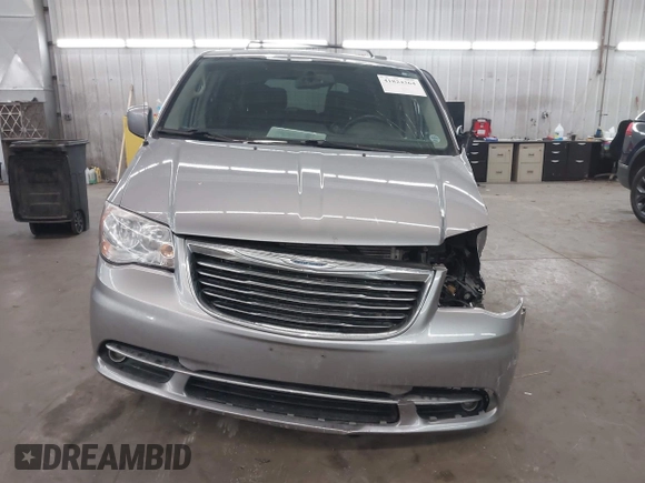 2013 Chrysler Town & Country Touring with VIN 2C4RC1BG9DR714736, listed as a IAAI auction lot 41824364 with 156,486 mi miles. Bid and sale history available at carsss.com. Image 13.