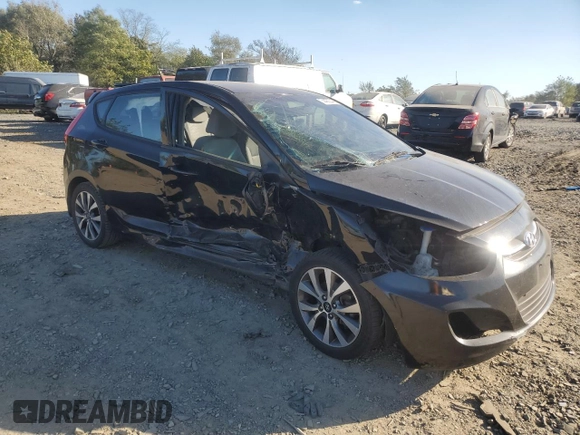 2015 Hyundai Accent Sport with VIN KMHCU5AE6FU234035, listed as a Copart auction lot 74429244 with 228,512 mi miles and Salvage Title. Bid and sale history available at carsss.com. Image 4.