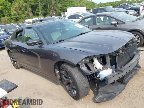 2015 Dodge Charger SXT with VIN 2C3CDXHGXFH897395, listed as a IAAI auction lot 42383907 with 145,334 mi miles and . Bid and sale history available at DreamBid. Image 1.