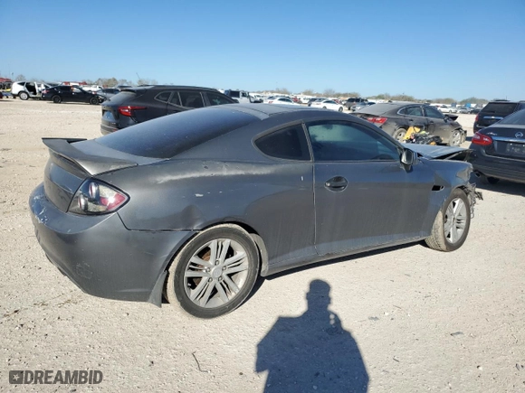 2007 Hyundai Tiburon GS with VIN KMHHM66D07U255007, listed as a Copart auction lot 87048324 with 194,935 mi miles and Salvage Title. Bid and sale history available at carsss.com. Image 3.