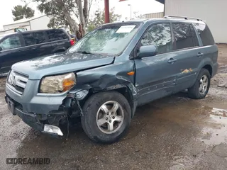 2007 Honda Pilot EX with VIN 2HKYF18437H528868, listed as a IAAI auction lot 41762030 with 203,212 mi miles. Bid and sale history available at carsss.com. Image 2.