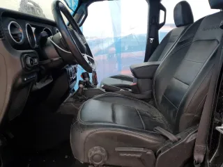 2022 Jeep Wrangler Unlimited Sahara с VIN 1C4JJXP68NW238204, выставлен на аукционе Copart как лот 49292205 с пробегом 35 058 миль миль и Списание • Salvage title. История ставок и продаж доступна на DreamBid. Изображение 7.