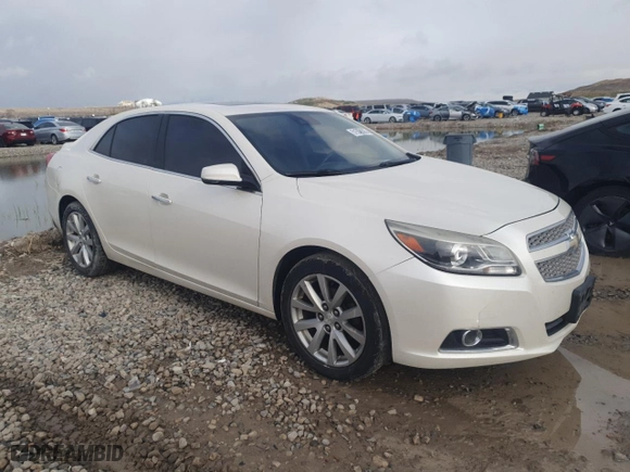 2013 Chevrolet Malibu LTZ with VIN 1G11H5SA5DF129394, listed as a Copart auction lot 51552605 with 136,982 mi miles and Salvage Title. Bid and sale history available at carsss.com. Image 4.