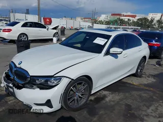 2020 BMW 3 Series 330i with VIN 3MW5R1J02L8B31552, listed as a IAAI auction lot 41760488 with 32,918 mi miles. Bid and sale history available at carsss.com. Image 2.