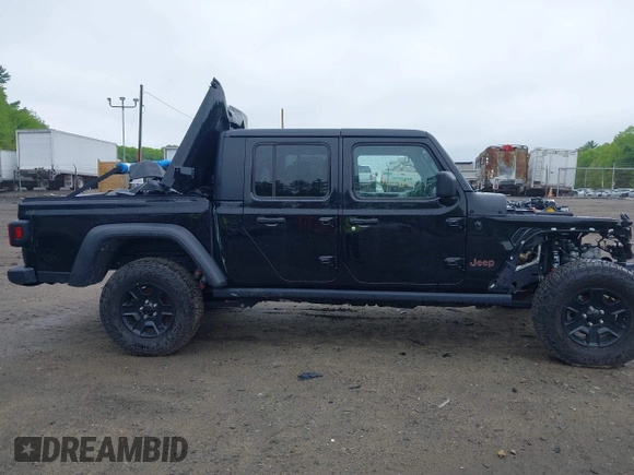 2021 Jeep Gladiator Mojave z VIN 1C6JJTEG9ML605638, wystawiony jako IAAI lot #40302253 z przebiegiem 32 019 mil mil oraz . Historia ofert i sprzedaży dostępna na DreamBid. Obrazek 13.
