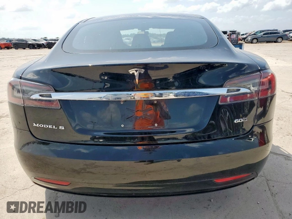 2016 Tesla Model S 90D с VIN 5YJSA1E21GF168439, выставлен на аукционе Copart как лот 60703035 с пробегом 102 905 миль миль и Списание • Salvage title. История ставок и продаж доступна на DreamBid. Изображение 6.