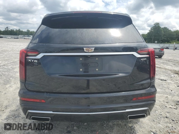 2020 Cadillac XT6 FWD Premium Luxury with VIN 1GYKPCRS9LZ205904, listed as a Copart auction lot 60575174 with 90,432 mi miles and Salvage Title. Bid and sale history available at carsss.com. Image 6.