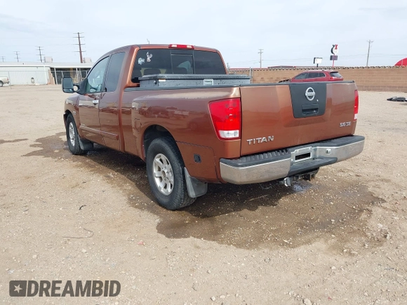 2004 Nissan Titan XE with VIN 1N6AA06A04N508069, listed as a IAAI auction lot 41571931 with 180,119 mi miles. Bid and sale history available at carsss.com. Image 3.