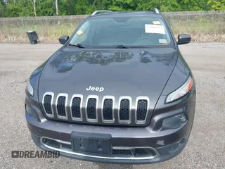 2014 Jeep Cherokee Limited z VIN 1C4PJMDSXEW294199, wystawiony jako IAAI lot #42466782 z przebiegiem 137 783 mil mil oraz . Historia ofert i sprzedaży dostępna na DreamBid. Obrazek 6.