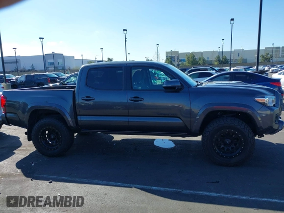2018 Toyota Tacoma SR5 z VIN 3TMAZ5CN0JM077058, wystawiony jako IAAI lot #41685472 z przebiegiem 37 945 mil mil oraz . Historia ofert i sprzedaży dostępna na DreamBid. Obrazek 14.