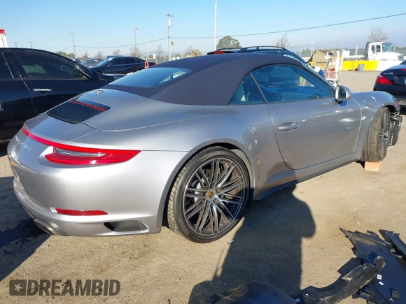 2019 Porsche 911 Carrera with VIN WP0CA2A92KS129254, listed as a IAAI auction lot 41392032 with 26,153 mi miles. Bid and sale history available at carsss.com. Image 4.