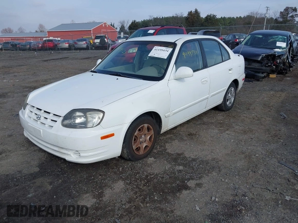 2004 Hyundai Accent GL with VIN KMHCG45C64U539526, listed as a IAAI auction lot 41199434 with 81,442 mi miles. Bid and sale history available at carsss.com. Image 2.