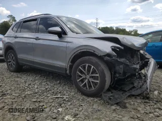 2020 Volkswagen Tiguan SE with VIN 3VV2B7AX4LM022562, listed as a Copart auction lot 69816034 with 61,789 mi miles and Salvage Title. Bid and sale history available at DreamBid. Image 4.