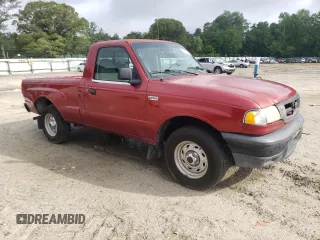 2003 Mazda B-Series Truck SX z VIN 4F4YR12D83TM01711, wystawiony jako Copart lot #56626605 z przebiegiem 179 991 mil mil oraz Szkody całkowita. Historia ofert i sprzedaży dostępna na DreamBid. Obrazek 4.