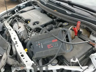 2018 Chevrolet Cruze LT z VIN 1G1BH5SE7J7151233, wystawiony jako IAAI lot #43190642 z przebiegiem 95 275 mil mil oraz . Historia ofert i sprzedaży dostępna na DreamBid. Obrazek 19.