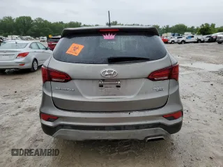 2018 Hyundai Santa Fe 2.4L z VIN 5NMZTDLB0JH087449, wystawiony jako Copart lot #58903105 z przebiegiem 114 037 mil mil oraz Szkoda całkowita • Salvage title. Historia ofert i sprzedaży dostępna na DreamBid. Obrazek 6.