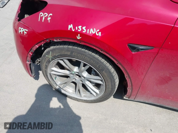 2023 Tesla Model Y Long Range z VIN 7SAYGAEE7PF691499, wystawiony jako IAAI lot #42038850 z przebiegiem 26 439 mil mil oraz . Historia ofert i sprzedaży dostępna na DreamBid. Obrazek 24.