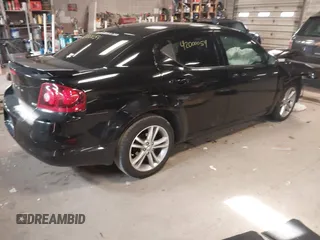 2014 Dodge Avenger SXT z VIN 1C3CDZCB3EN156146, wystawiony jako IAAI lot #42000054 z przebiegiem 149 166 mil mil oraz . Historia ofert i sprzedaży dostępna na DreamBid. Obrazek 4.