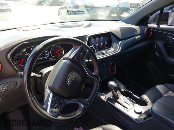 2021 Chevrolet Blazer RS z VIN 3GNKBERS4MS523208, wystawiony jako IAAI lot #42078498 z przebiegiem 63 851 mil mil oraz . Historia ofert i sprzedaży dostępna na DreamBid. Obrazek 21.