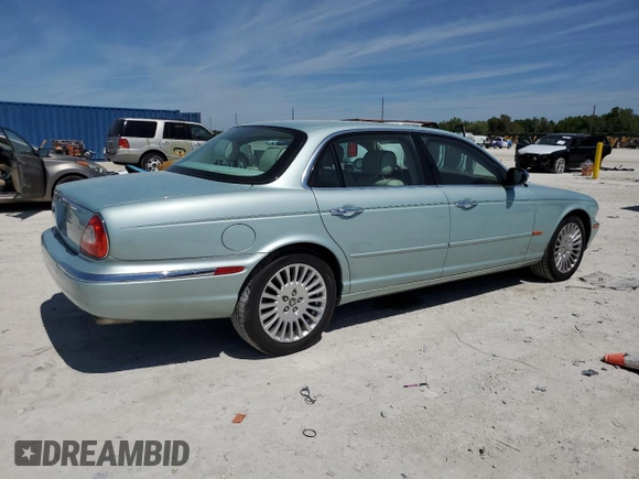 2005 Jaguar XJ Vanden Plas z VIN SAJWA82CX5SG35644, wystawiony jako Copart lot #49029245 z przebiegiem 88 771 mil mil oraz Szkoda całkowita • Salvage title. Historia ofert i sprzedaży dostępna na DreamBid. Obrazek 3.
