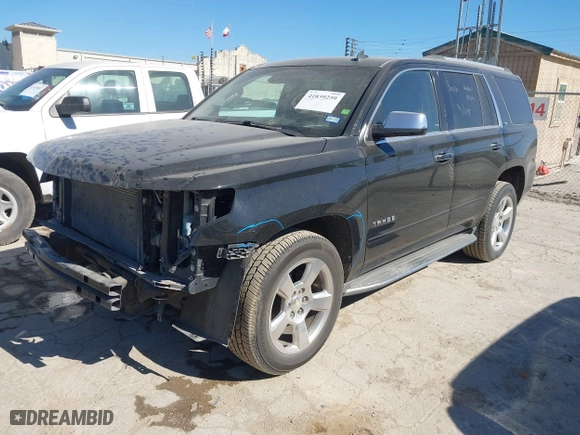 2015 Chevrolet Tahoe LTZ with VIN 1GNSCCKCXFR117525, listed as a IAAI auction lot 41839259 with 143,413 mi miles. Bid and sale history available at carsss.com. Image 19.