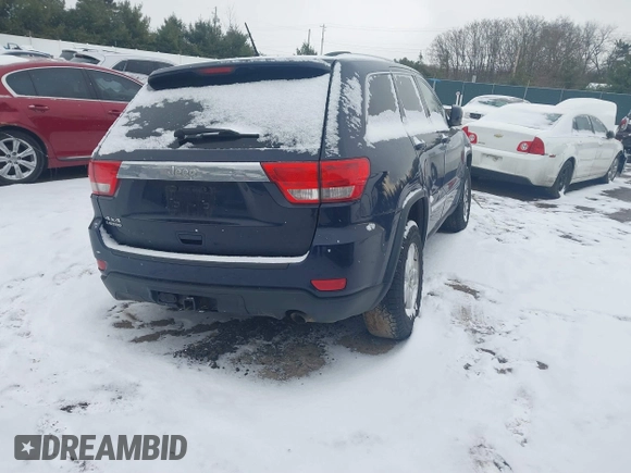 2013 Jeep Grand Cherokee Laredo with VIN 1C4RJFAGXDC542987, listed as a IAAI auction lot 41262770 with 199,273 mi miles. Bid and sale history available at carsss.com. Image 4.