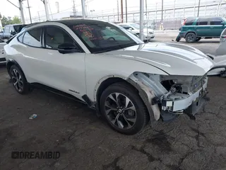 2021 Ford Mustang Mach-E Premium with VIN 3FMTK3SU6MMA27937, listed as a IAAI auction lot 42033076 with 90,743 mi miles and . Bid and sale history available at DreamBid. Image 1.