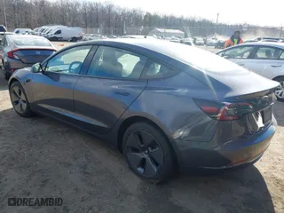 2023 Tesla Model 3 with VIN 5YJ3E1EA7PF641292, listed as a IAAI auction lot 41750420 with 111,370 mi miles. Bid and sale history available at carsss.com. Image 3.