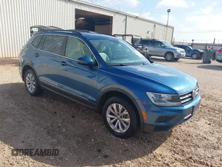 2018 Volkswagen Tiguan SEL z VIN 3VV3B7AX2JM091526, wystawiony jako IAAI lot #42395767 z przebiegiem 221 156 mil mil oraz . Historia ofert i sprzedaży dostępna na DreamBid. Obrazek 1.